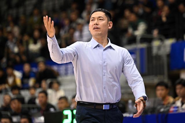 九游体育首页入口-啃下决战从小组顺利突围 张庆鹏篮球哲学的胜利